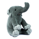 View of the organic realistic Asian Elephant stuffed animal sitting upright